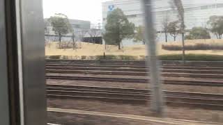 大府駅を通過する311系特別快速！車内から。