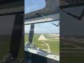 Coming in for a landing in a Ford Tri-Motor plane.