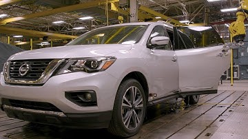 Nissan’s door-durability robot "Mrs. Doorboto" at the NTCNA in Michigan