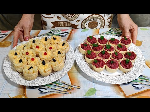 Two types of delicious herring and pineapple tartlets