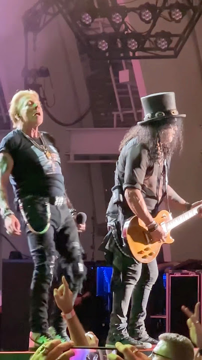 Slash Teases the Crowd While Axl Rose Asks the Famous Question