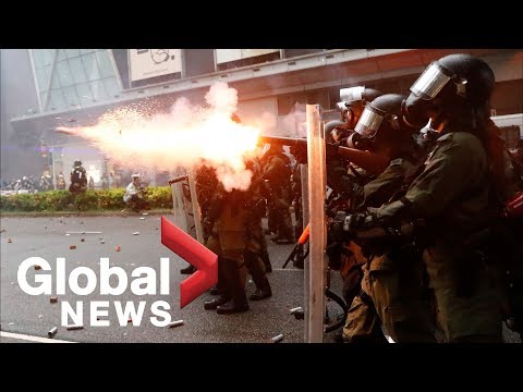 Hong Kong police fire water cannons, tear gas as protesters take to the streets