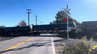 Kcs sd70ace leads oil train with Canadian pacific trailing 