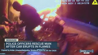 Police Officers Rescue Man After Car Erupts In Flames