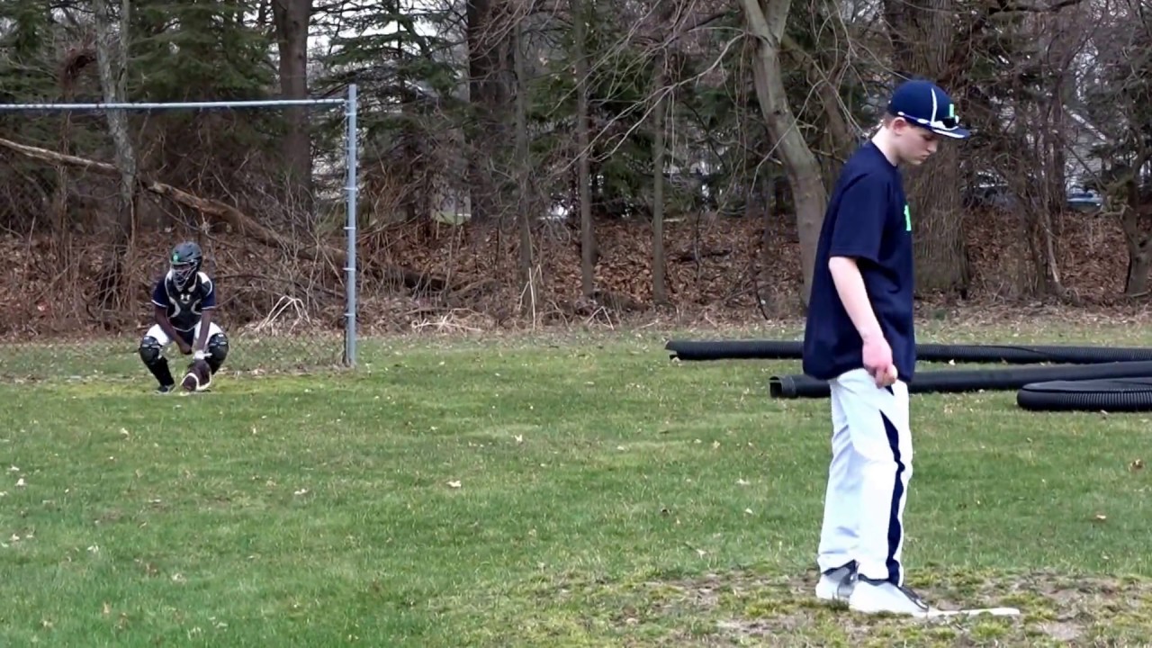 Spencer practicing pitching.