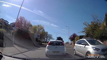 23/04/17 12.45 - A car passing queuing traffic by driving on the pavement - A540 / B5139