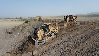 Caterpillar D9T Bulldozers Pushing Soil On Huge Mining Site  Aerial View