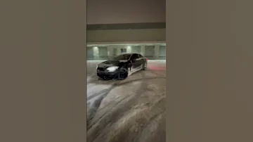 Straight piped BMW M2 deep snow slides