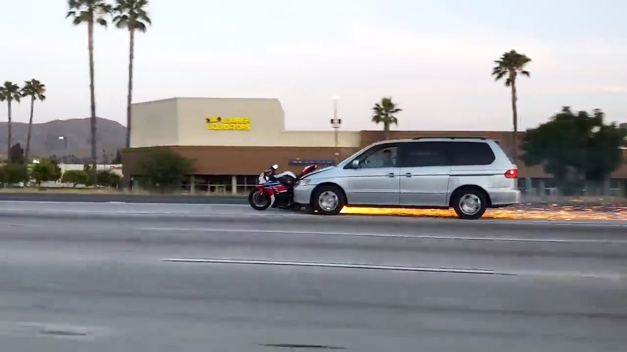 Van Driver Hits Motorcycle and Drags it Along on Highway - YouTube