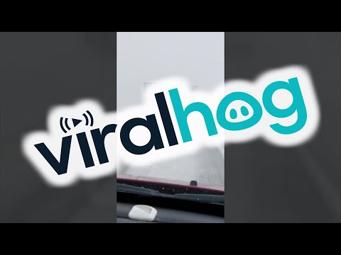 A Snowy Semi Drive || ViralHog
