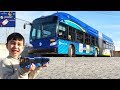 Johny opens a new mta articulated bus toy  and rides an nyc mta bus