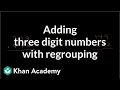 Adding three digit numbers with regrouping  addition and subtraction  arithmetic  khan academy