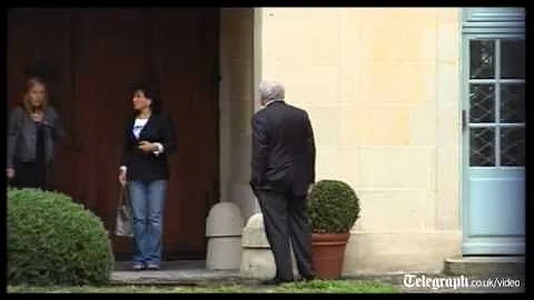 Dominique Strauss-Kahn returns home