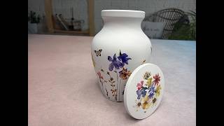 Beautiful wildflowers on this white metal urn