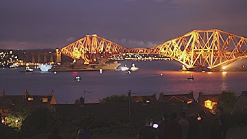 HMS Queen Elizabeth sails beneath Forth Bridges
