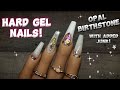 Hard gel extension gel opal nails with added junk  october birthstone nail design