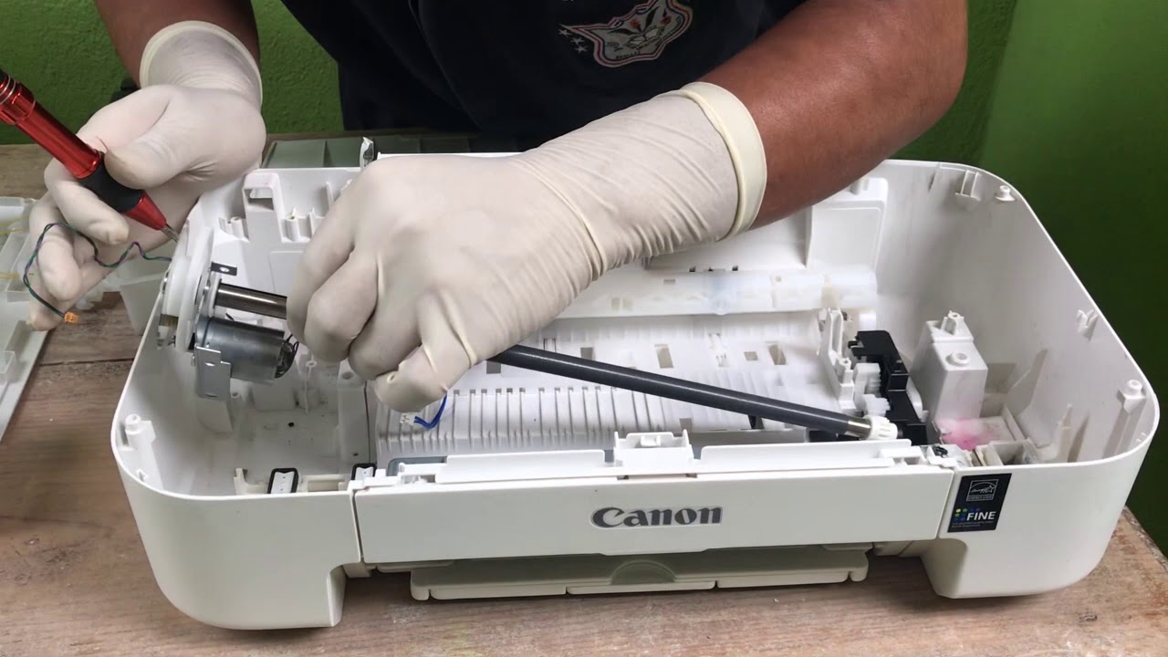 Como darle mantenimiento a una impresora canon ip2810. - YouTube