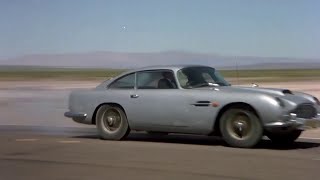 Roger Moore driving Aston Martin - The Cannonball Run