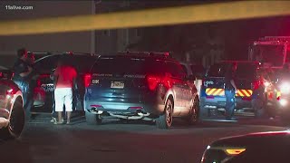 Daughter killed, mother shot outside of an apartment complex on NW Atlanta