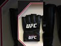 FRAME TO DISPLAY UFC, MMA GLOVE ALSO TITLE AND PHOTO