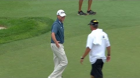 Steve Stricker scoops it in for birdie on No. 16 at the Memorial