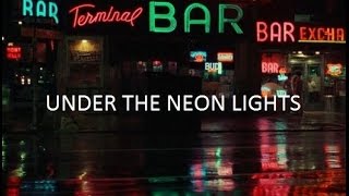 UNDER THE NEON LIGHTS