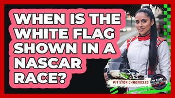 When is the white flag shown in a NASCAR race?