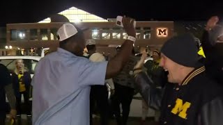Wolverines greeted by fans in Ann Arbor after beating Ohio State
