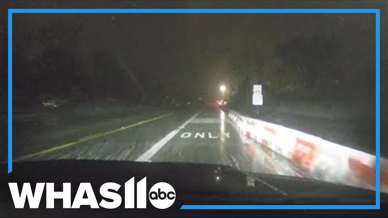 Roads slick across Louisville as snow moves over Kentucky - YouTube