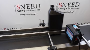 Meenjet M6 Automatic Printer with JS21 White Ink on Black Quart Bottles