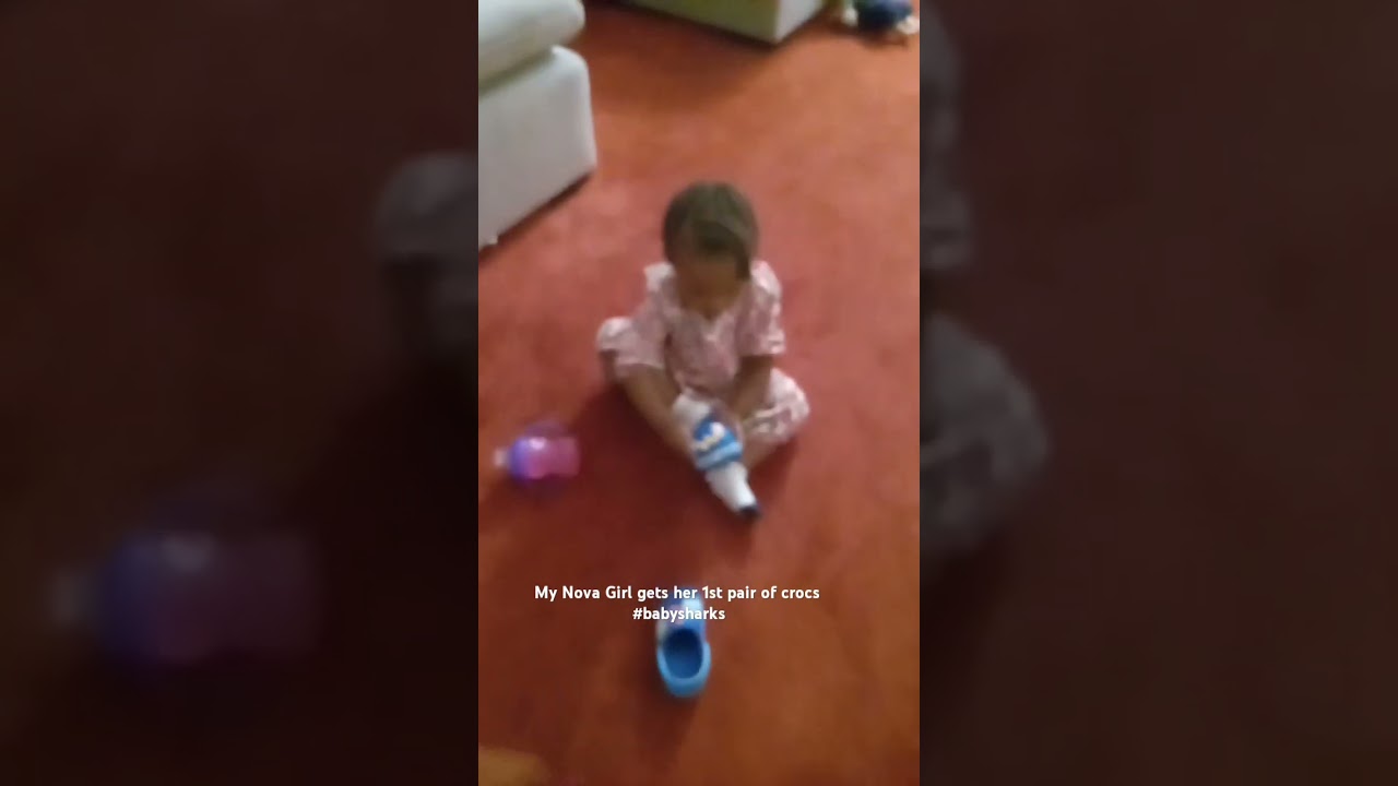 NovaGirl  and her baby shark crocs