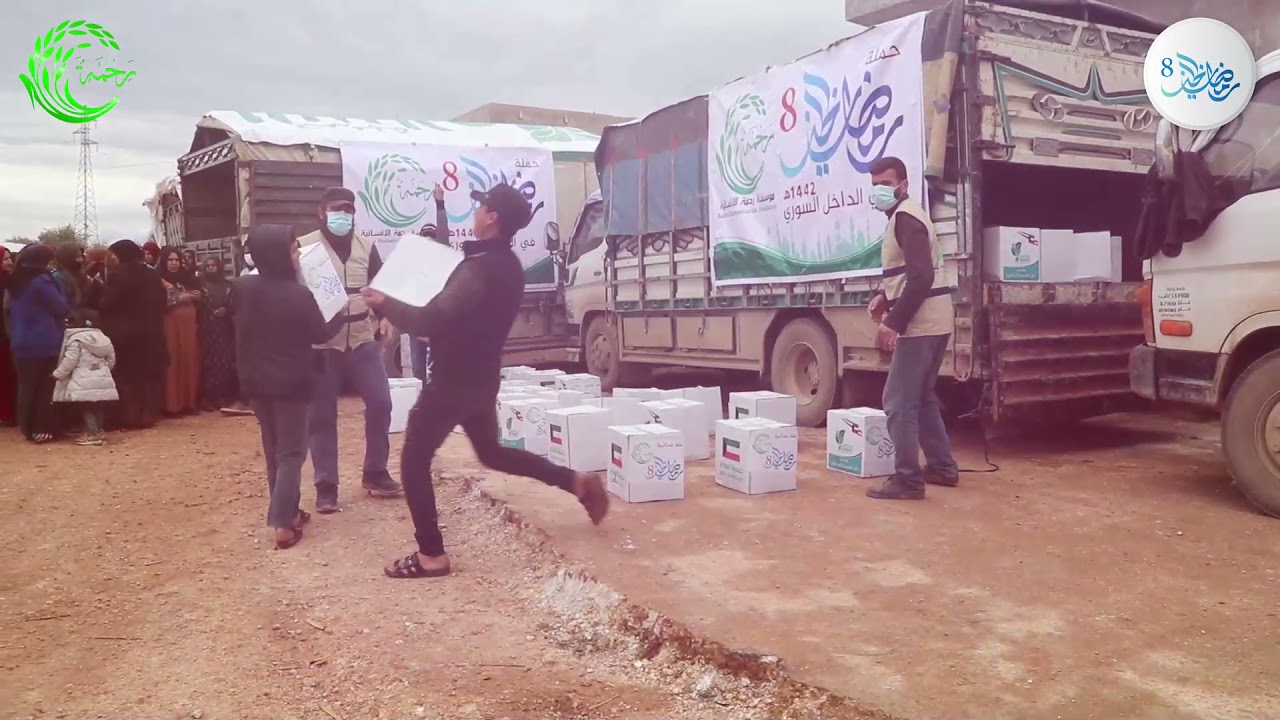 توزيع السلال الرمضانية الغذائية  على أهلنا في مخيم الصفصافة بلدة حارم #ريف_إدلب