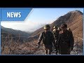 North Korean troops cross the border for guard post inspections