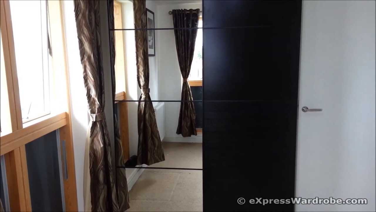 Ikea pax ilseng black brown sliding door wardrobe design youtube Ikea pax