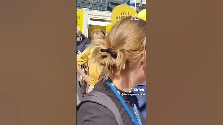A Man Being Arrested Right At a Pro-EU Rally In Finland For Yelling At At Ursula Von der Leyen