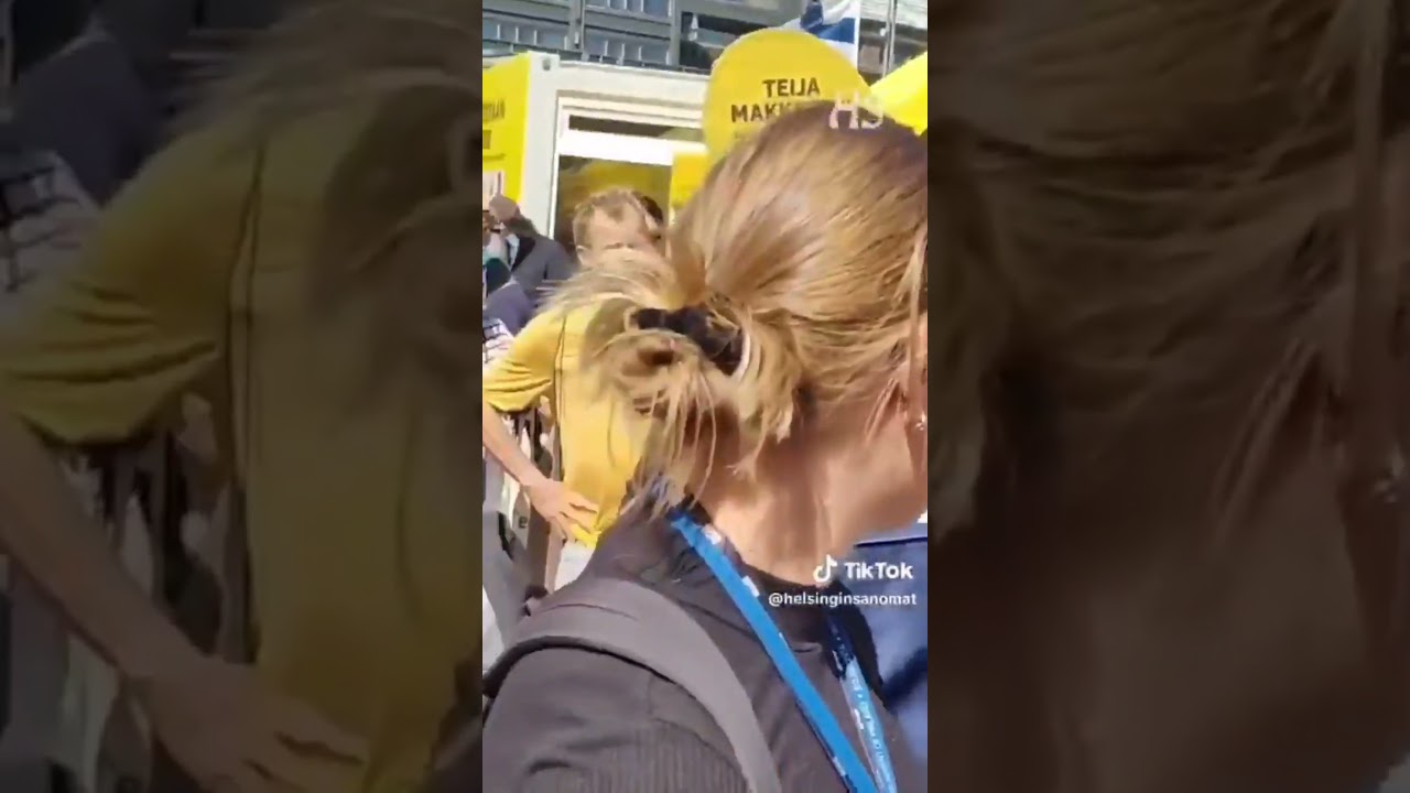 A Man Being Arrested Right At a Pro-EU Rally In Finland For Yelling At At Ursula Von der Leyen