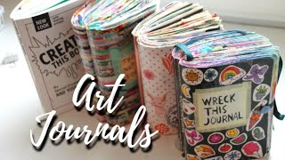 comparing all of my art journals... which one is the best?