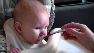 Ansley's first time eating cereal
