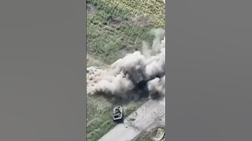 Ukraine war, A Russian BMP-1 drives over a anti tank mine in the village of Yakivlivka