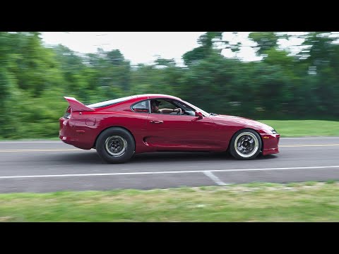 Modified Cars Leaving A Car Show Street Scene 2025