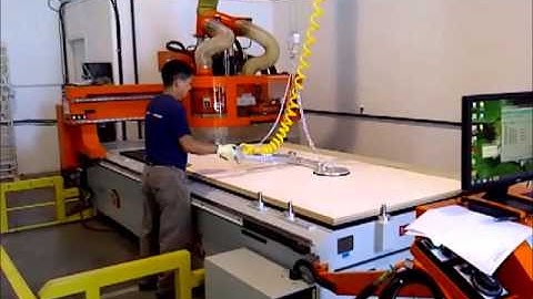 Delaney Vacuum Panel Lifting Arm loading CNC Router From Akhurst Machinery