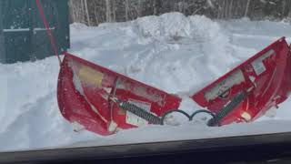 Honda pioneer plowing over a foot of snow