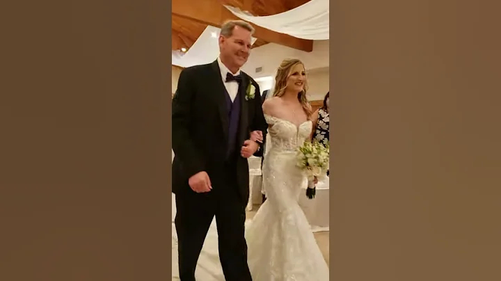 Very happy Dad walking Jenny Lloyd down the aisle,...