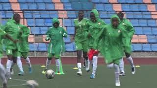 Kenya's Junior Starlets  feel the pitch at Abebe Bekila Stadium in Addis Ababa Ethiopia .