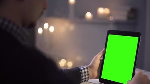 Man Using Tablet In Cafe Stock Video