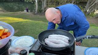 Awesome Curried sausages in the camp oven.