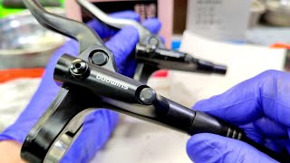 Leaking hydraulic brake on a bicycle. Replacing a Shimano MT201 brake