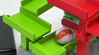 Marblevator, Self Reversing Screw Lift, Close Up.