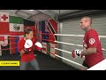 Mea Motu does padwork with Isaac Peach preparing for IBO world super bantamweight title fight