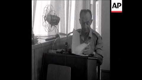 SYND 04-9-69 A SUSPECT IS BROUGHT BEFORE AN OFFICIAL INQUIRY